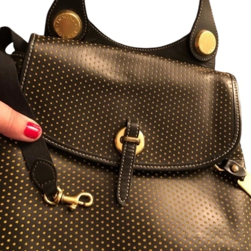 Dooney & Bourke Cabrio black leather laser cut w/ tag & serial number, vintage